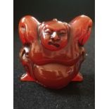 Carved sumo wrestler figure / netsuke with signature to base