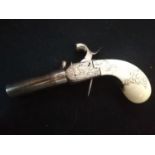 Cased pair of antique percussion pistols with ivory grips & hand chased decoration -guns 4" long