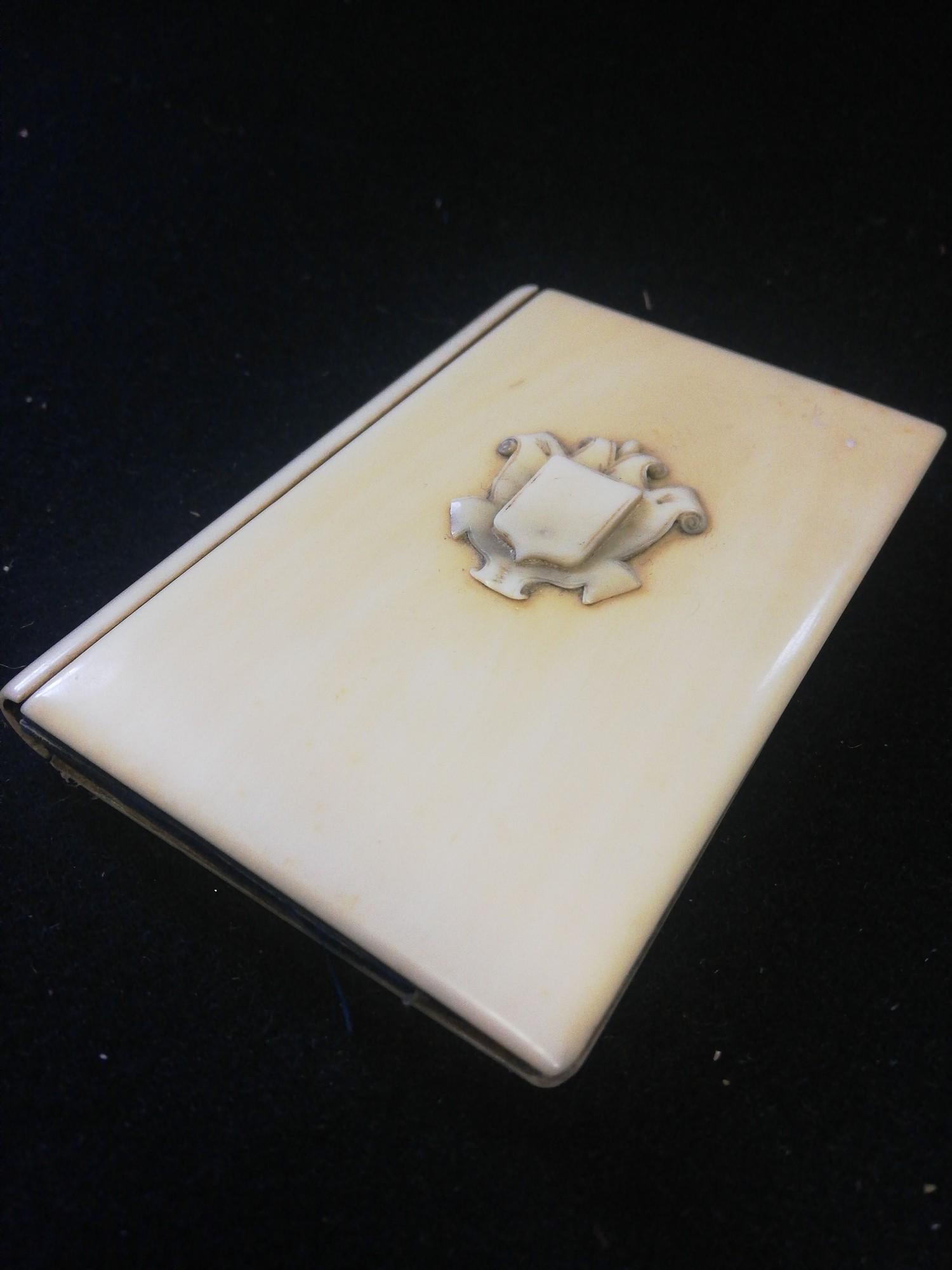 Antique ivory notebook