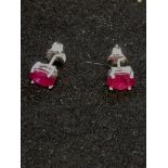 Pair of silver ruby studs (treated)