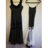 antique black satin sleeveless dress t/w a black petticoat with white netting