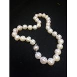 String of cultured pearls with a 9ct white gold satin effect ball clasp