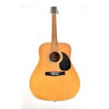 MEMPHIS; a six string acoustic guitar.