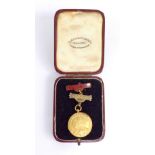 A 9ct yellow gold London Midland and Scottish Railway Ambulance Centre long service medal