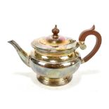 COOPER BROTHERS; a boxed Elizabeth II hallmarked silver teapot, stamped 'Regent' to base, length