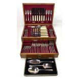 WALKER & HALL; an oak cased canteen of silver plated cutlery and a silver plated three piece cake