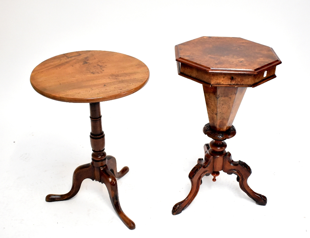 A Victorian burr walnut veneered octagonal work table with fitted interior (modern replacement) on