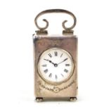An Edward VII hallmarked silver cased miniature time piece, the case monogrammed 'NLL' to top