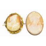 Two assorted cameo brooches including example one set within silver mount, 7 x 5cm, the second in