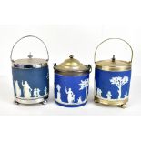 WEDGWOOD; three blue jasper dip biscuit barrels with silver plated mounts (one with incorrect