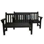 A near pair of garden benches, one a three seater, the other a two seater, each with slatted