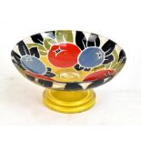 HENRI QUENVIL; an Art Deco hand painted pedestal bowl, painted with fruit, signed to body,