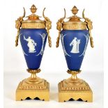 WEDGWOOD; a pair of blue jasperware gilt metal mounted cassolettes of ovoid tapering form, unmarked,