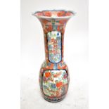A large Japanese Imari floral vase, painted with panels depicting birds and foliage, height 101cm (