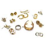 A mixed group of jewellery including yellow metal framed carved cameo brooch, various earrings, 18ct