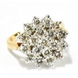 A 9ct yellow gold diamond cluster ring, with nineteen round brilliant cut diamonds, total diamond