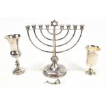 A Dutch silver menorah on loaded spreading circular base, approx 18.5 x 18cm (af), a kiddush cup