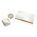 A WILCOX; an Elizabeth II hallmarked silver mounted rectangular cigarette box, 11 x 17cm, a