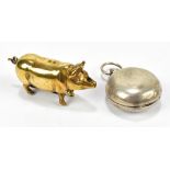 A hallmarked silver round sovereign case, Birmingham 1901, also a novelty pig shaped brass vesta (