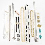 A mixed group of costume jewellery including faux pearl necklaces, dress watches, etc, also a