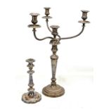 A large silver plated three branch four sconce candelabrum on tapered column to spreading circular