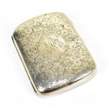 CHARLES COOKE; an Edward VII hallmarked silver cigarette case, with monogrammed cartouche, Chester