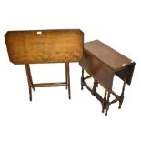 A reproduction mahogany dropleaf gateleg table together with a further mahogany folding table (2).