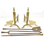 A pair of neo-Classical brass andirons, a set of three companion tools and two brass trivets (7).