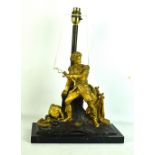 A late 19th century French bronzed and gilt metal figural table lamp raised on rectangular marble