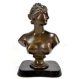 A 19th century bronze bust depicting a nude female, raised on socle base, height 31cm.