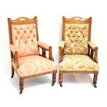 A pair of Victorian lady's and gentleman's oak framed armchairs (2).
