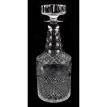 An Elizabeth II hallmarked silver collared clear glass decanter with etched floral detail and