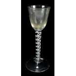 An 18th century wine glass with twisted stem decoration, height 15cm. (af)Additional InformationDirt