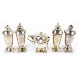 EMILE VINER; two George VI hallmarked silver pairs of peppers and salts, and a mustard with blue