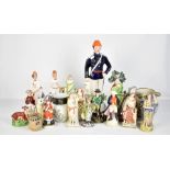 Fifteen assorted 19th century and later Staffordshire figures, also two 19th century pearl ware