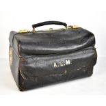 ASPREY; a large black leather bag, with pressed initialling, and P&O Arcadia Cruise shipping