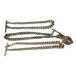 Three hallmarked silver T-bar watch chains of graduated size, one with a silver fob, approx 6.2ozt/