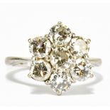 GRAFF; an 18ct white gold and diamond floral set ring, each of the seven brilliant cut stones