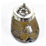 An early 20th century horse hoof inkwell with silver plated mount and shield, height 9cm.