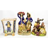 A French Quimper faience jardinière, also a Staffordshire flatback figure, and a figural group (3).