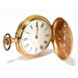 A 14ct yellow gold cased lady's fob watch, set with eight small white stones, the enamelled dial set