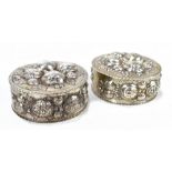 HESTERMANN & ERNST; a pair of circa 1900 German 800 grade silver circular boxes with hinged lids
