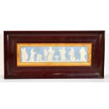 WEDGWOOD; a pale blue relief moulded plaque, approx 7 x 28cm, framed and glazed (af).Additional