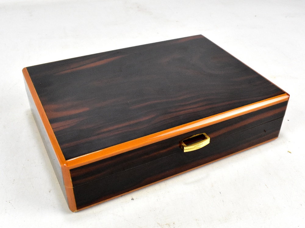 S DUPONT OF PARIS; a simulated coromandel humidor 22 x 30cm.