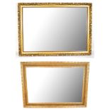 Two modern gilt framed wall mirrors including a bevelled example (2).