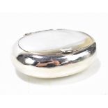 CHARLES S GREEN & CO LTD; a George V hallmarked silver oval squeeze/snuff box of plain form,
