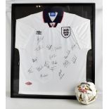 ENGLAND; a multi-signed Umbro football shirt including Peter Beardsley, Matt Le Tissier, etc, framed