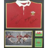 A framed Wales rugby shirt, autographed by J.P.R. Williams, Phil Bennet and Gareth Edwards, with