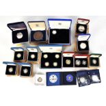 A group of predominantly proof silver coins including numerous £1 coins, commemorative crowns,