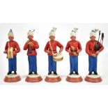 A group of five early 20th century Krishnanagar clay figures on bandsmen, each with a different